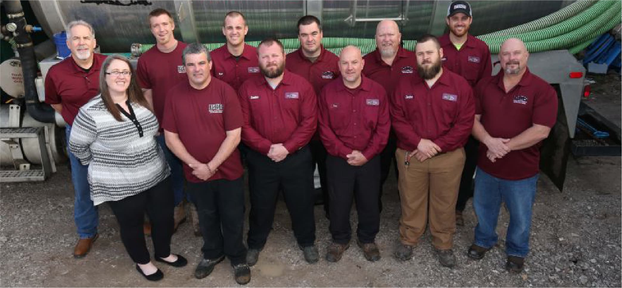 The BBB Septic team in front of a pump truck