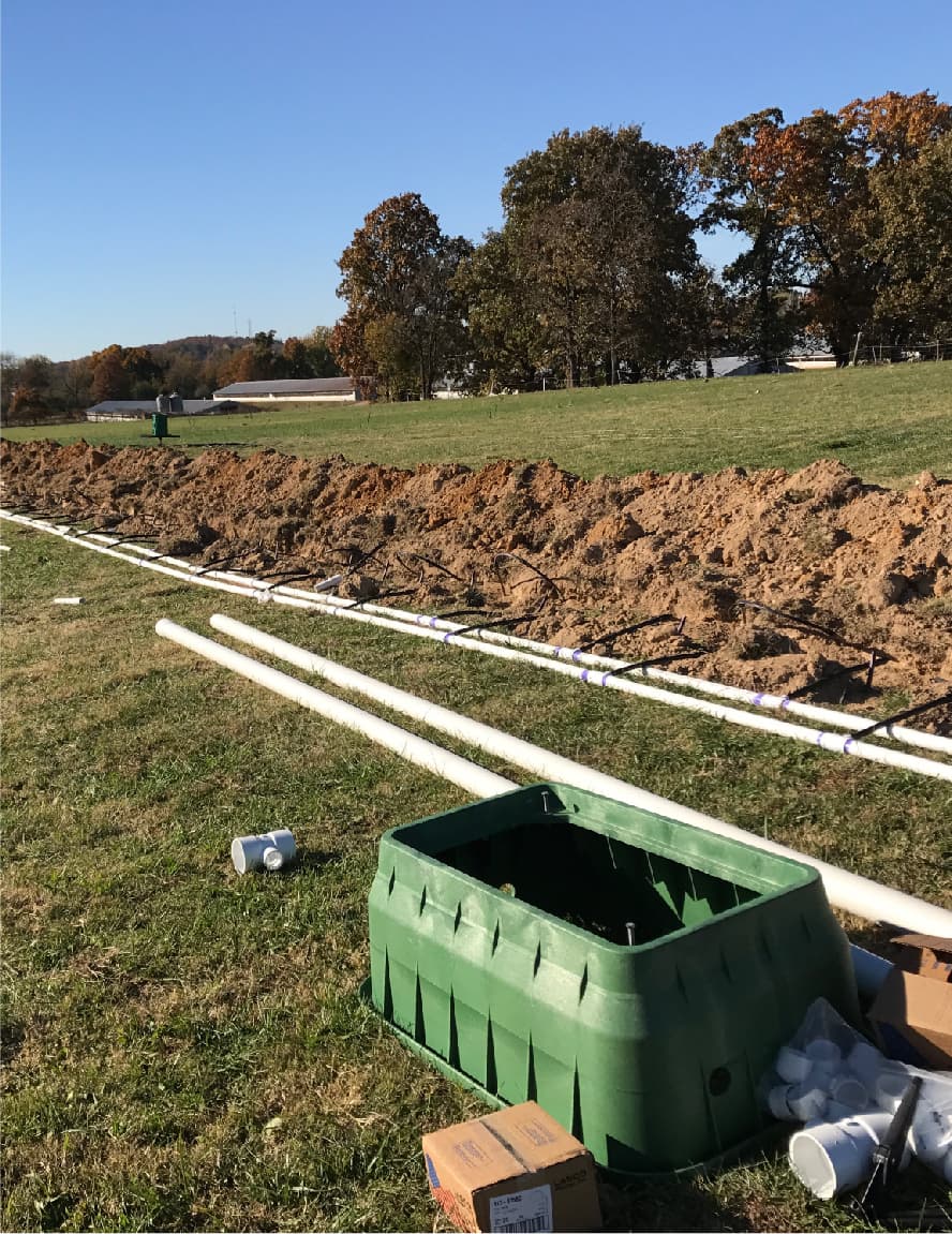 New septic lateral lines laid out across a field